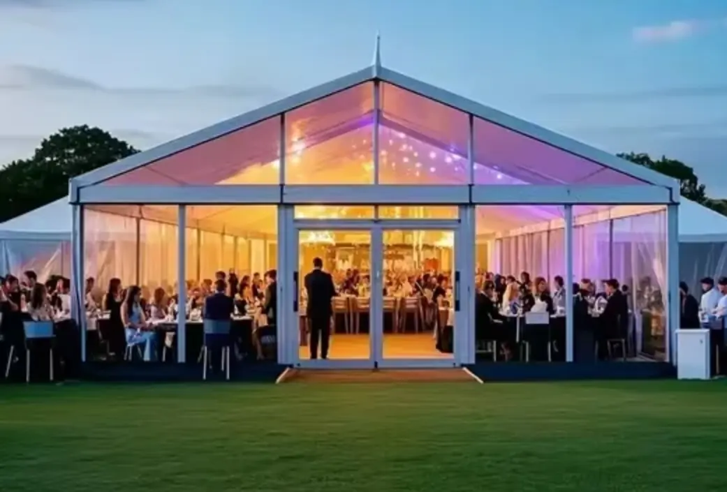Clear roof marquee with elegant lighting setup for evening events