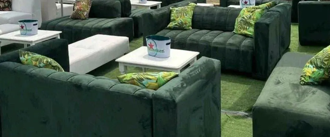 Dark green velvet lounge couches at branded outdoor corporate event — lounge couch hire South Africa