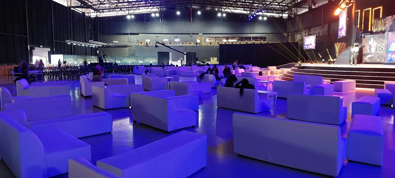 White couches and sofas arranged for corporate event lounge furniture hire in Johannesburg, Pretoria and Gauteng